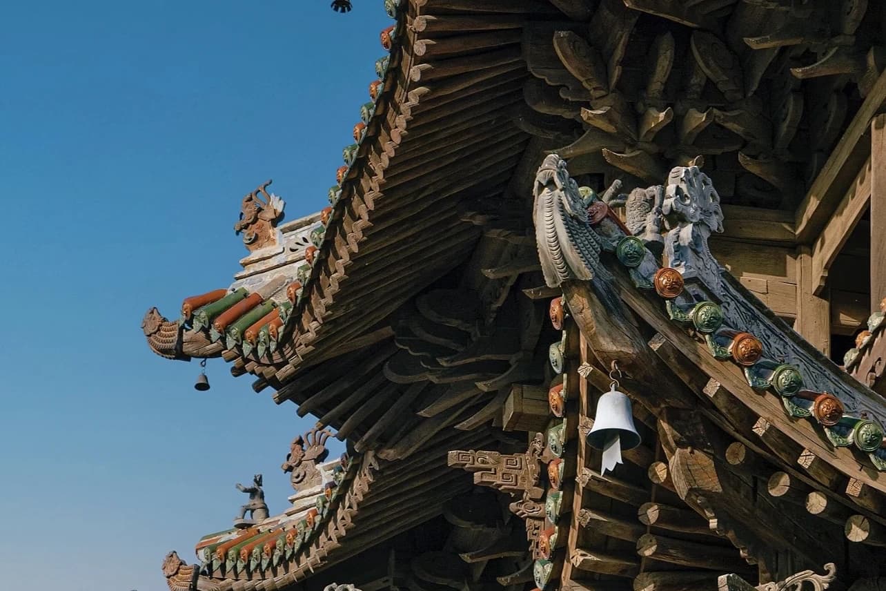 Layered timber eaves, roof ornaments and bracket work in Shanxi