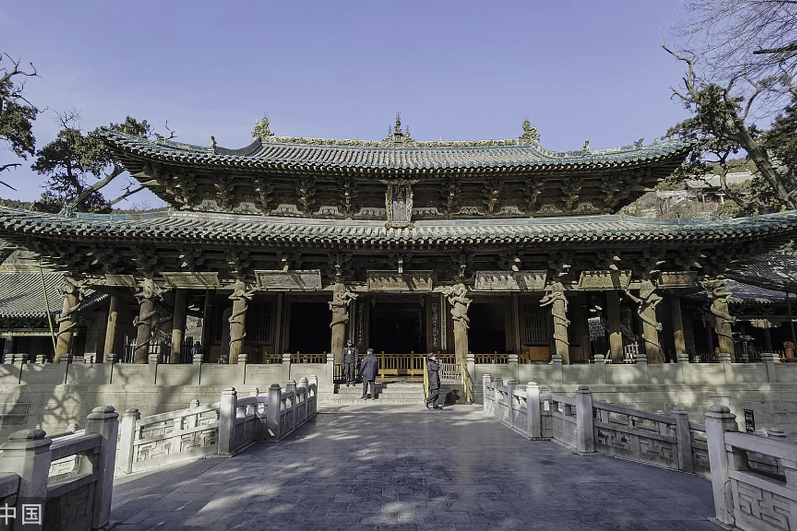 Jinci Temple complex viewed across its stone bridge and water feature near Taiyuan